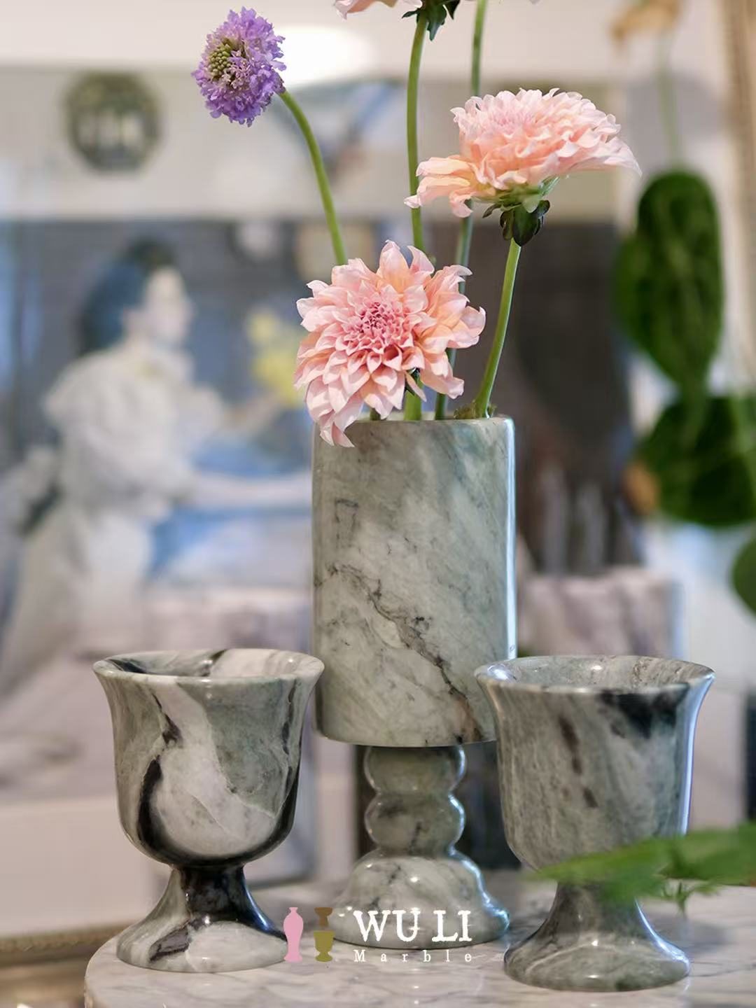 Artisan shaping a marble vase by hand